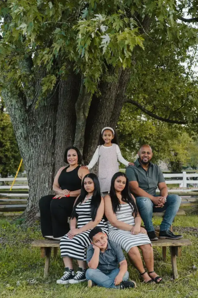 Family of six photographed under a maple tree by Create With Amy, Harford County photographer based in Bel Air, Maryland