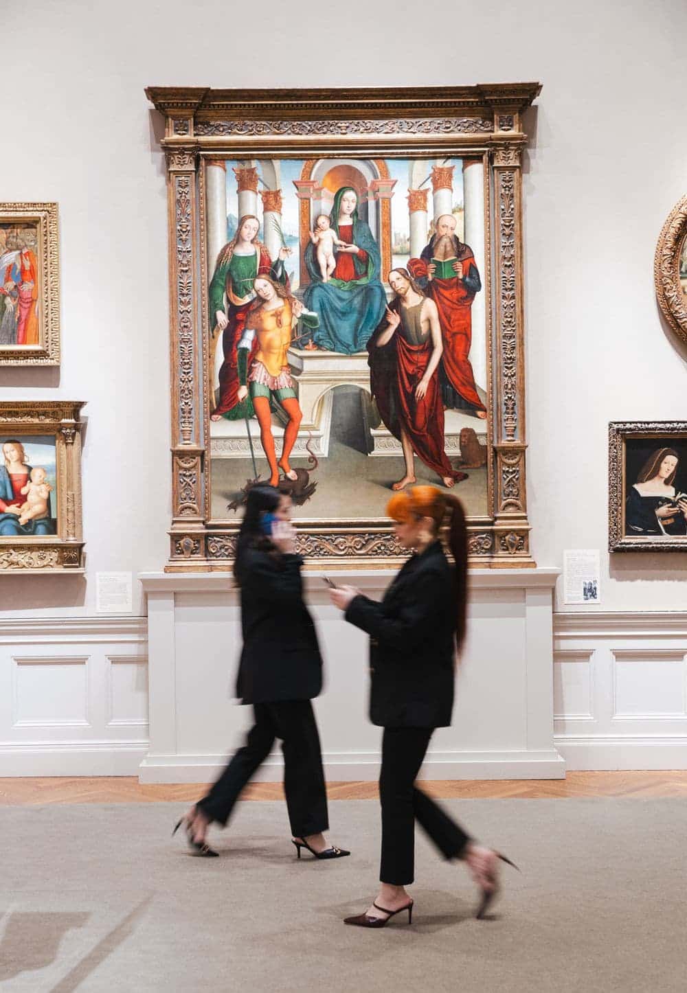 Editorial brand content of two business owners walking a museum gallery, from a Living The Shift session by Create With Amy